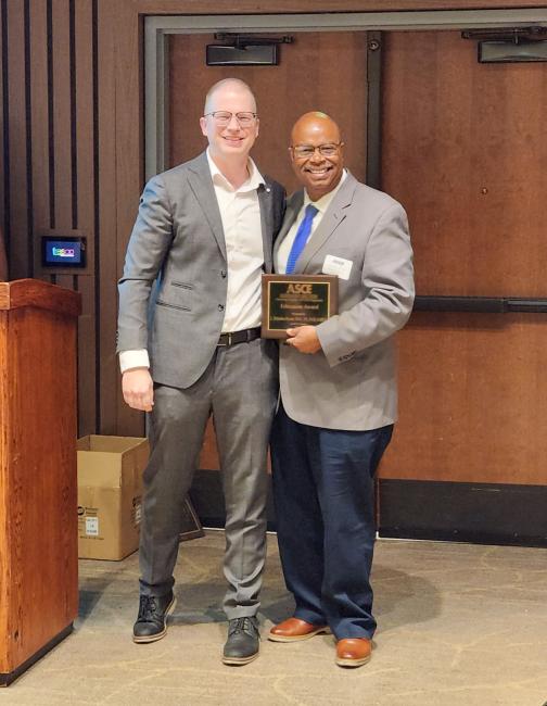 Bryson receiving award 